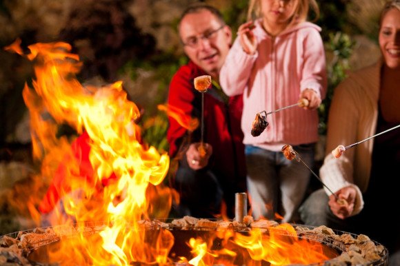 Family at the barbecue in the evening